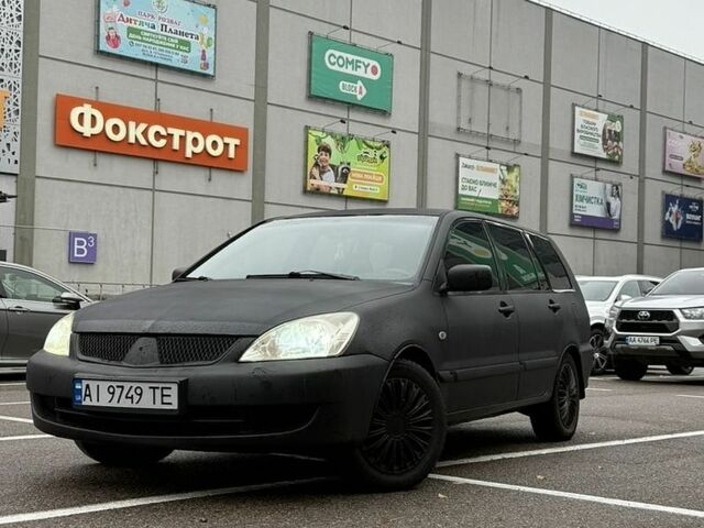 Чорний Міцубісі Lancer, об'ємом двигуна 1.6 л та пробігом 357 тис. км за 3200 $, фото 1 на Automoto.ua