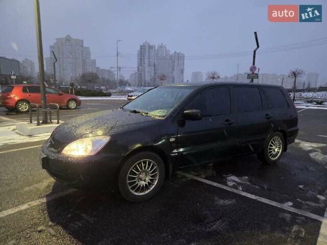 Чорний Міцубісі Lancer, об'ємом двигуна 1.6 л та пробігом 180 тис. км за 4100 $, фото 1 на Automoto.ua