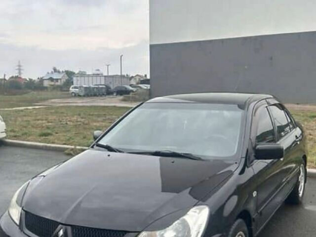 Чорний Міцубісі Lancer, об'ємом двигуна 1.6 л та пробігом 220 тис. км за 4100 $, фото 1 на Automoto.ua