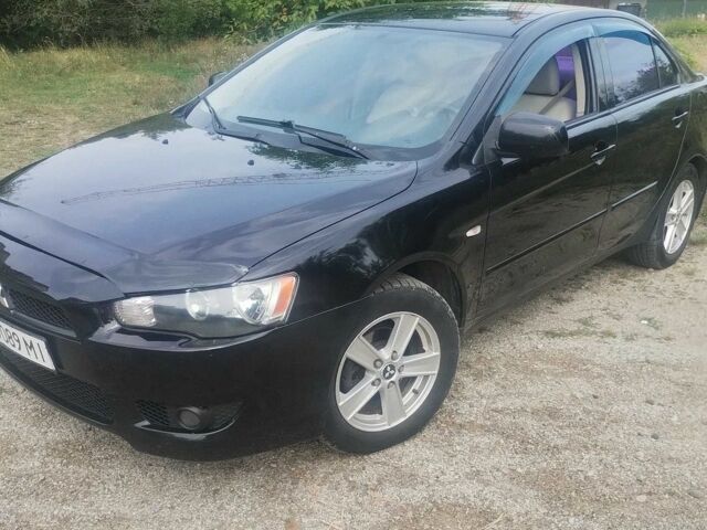 Чорний Міцубісі Lancer, об'ємом двигуна 2 л та пробігом 287 тис. км за 5002 $, фото 1 на Automoto.ua
