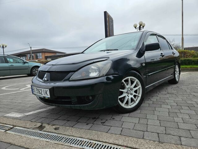 Міцубісі Lancer 2007 у Горішні Плавні (Комсомольськ) на Automoto.ua Чорний Міцубісі Lancer, об'ємом двигуна 2 л та пробігом 237 тис. км за 4300 $, фото 1 на Automoto.ua