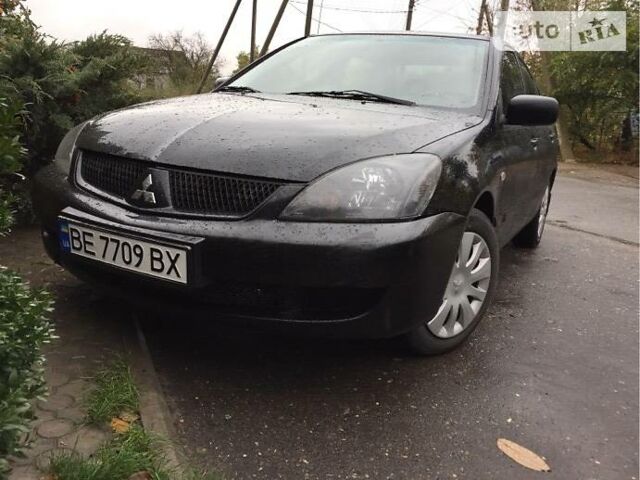 Чорний Міцубісі Lancer, об'ємом двигуна 1.6 л та пробігом 210 тис. км за 5800 $, фото 1 на Automoto.ua