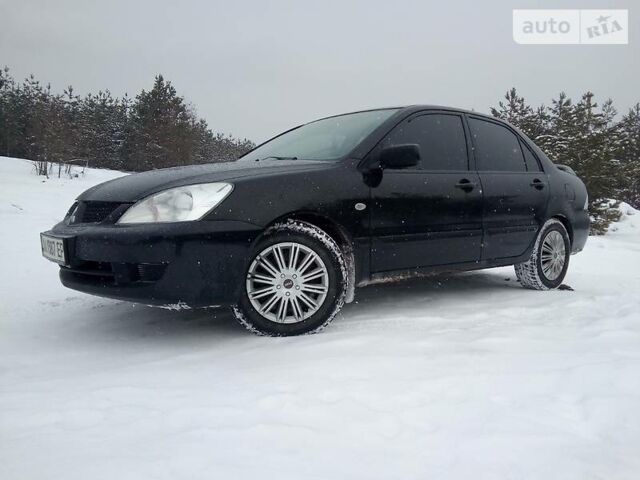 Чорний Міцубісі Lancer, об'ємом двигуна 0 л та пробігом 190 тис. км за 5900 $, фото 1 на Automoto.ua