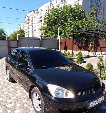 Чорний Міцубісі Lancer, об'ємом двигуна 1.6 л та пробігом 230 тис. км за 6500 $, фото 1 на Automoto.ua