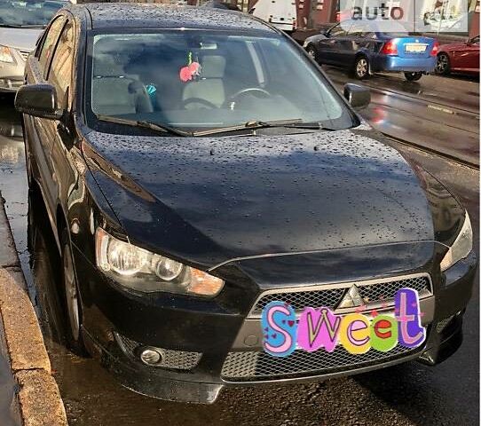 Чорний Міцубісі Lancer, об'ємом двигуна 2 л та пробігом 187 тис. км за 9500 $, фото 1 на Automoto.ua