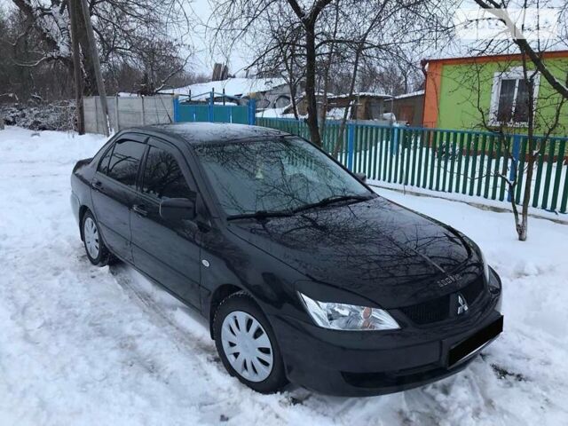 Чорний Міцубісі Lancer, об'ємом двигуна 0 л та пробігом 130 тис. км за 6300 $, фото 1 на Automoto.ua