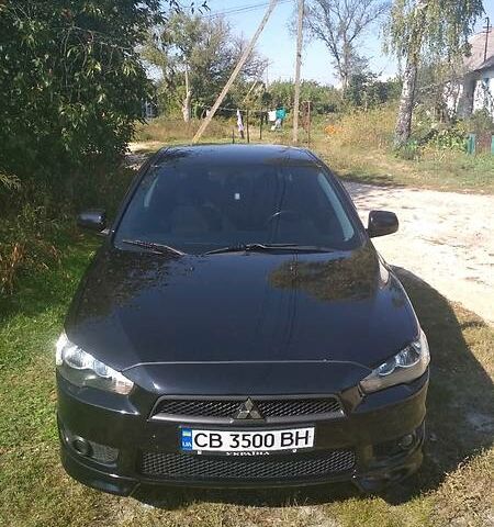 Чорний Міцубісі Lancer, об'ємом двигуна 2 л та пробігом 142 тис. км за 7800 $, фото 1 на Automoto.ua