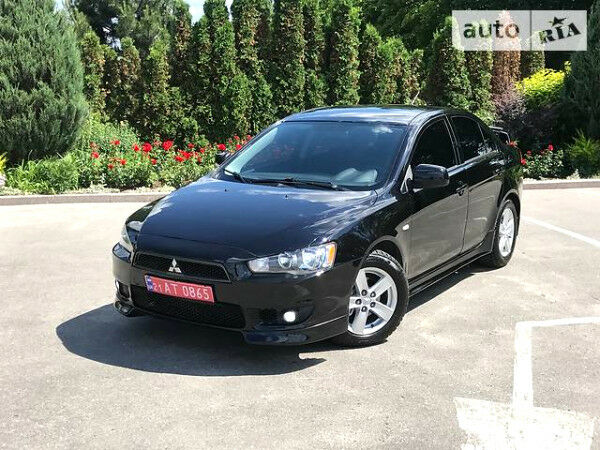 Чорний Міцубісі Lancer, об'ємом двигуна 2 л та пробігом 105 тис. км за 8400 $, фото 1 на Automoto.ua