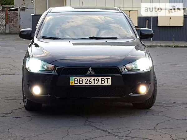 Чорний Міцубісі Lancer, об'ємом двигуна 1.5 л та пробігом 76 тис. км за 7000 $, фото 1 на Automoto.ua