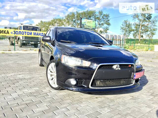 Чорний Міцубісі Lancer, об'ємом двигуна 2 л та пробігом 109 тис. км за 12500 $, фото 1 на Automoto.ua