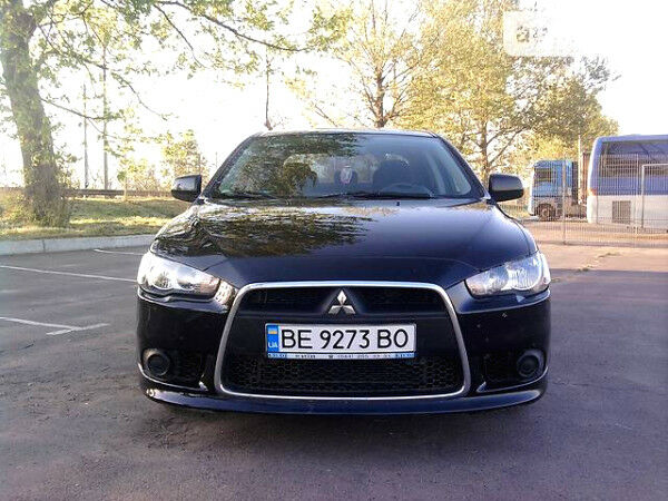 Чорний Міцубісі Lancer, об'ємом двигуна 1.6 л та пробігом 62 тис. км за 10899 $, фото 1 на Automoto.ua