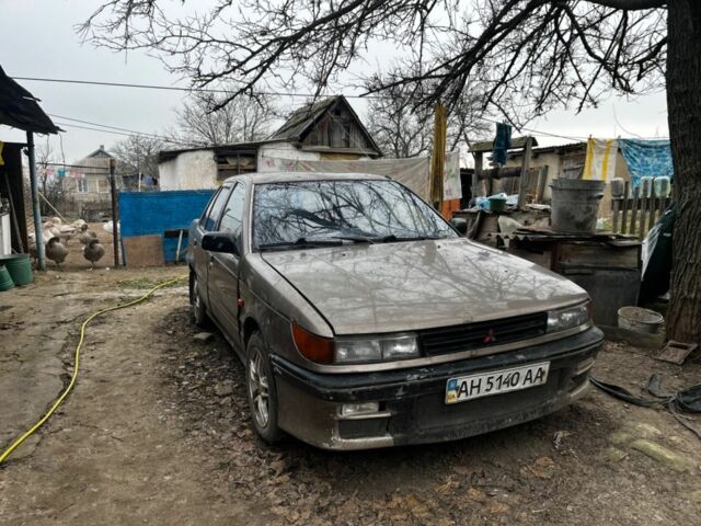 Коричневий Міцубісі Lancer, об'ємом двигуна 1.8 л та пробігом 200 тис. км за 1136 $, фото 1 на Automoto.ua