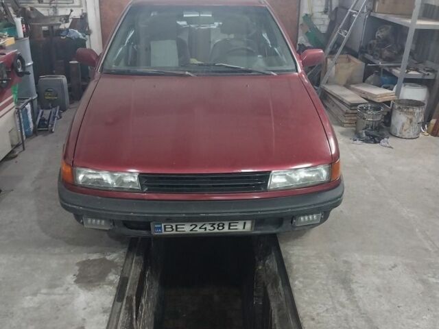 Червоний Міцубісі Lancer, об'ємом двигуна 1.5 л та пробігом 380 тис. км за 1419 $, фото 1 на Automoto.ua