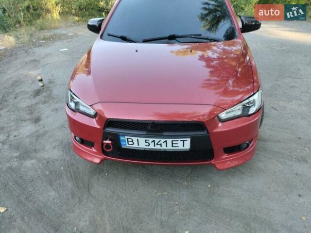 Червоний Міцубісі Lancer, об'ємом двигуна 2 л та пробігом 168 тис. км за 6800 $, фото 1 на Automoto.ua