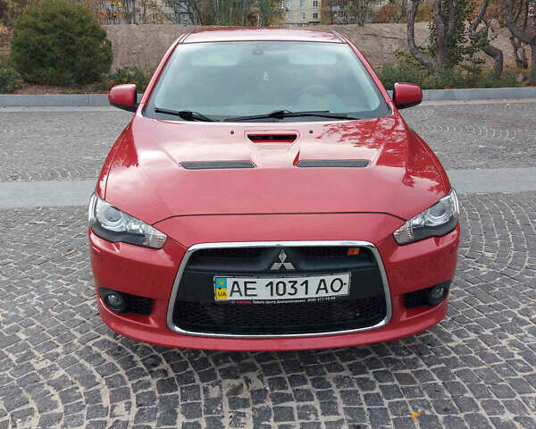 Червоний Міцубісі Lancer, об'ємом двигуна 2 л та пробігом 58 тис. км за 12900 $, фото 1 на Automoto.ua