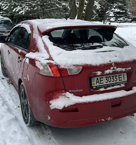 Красный Мицубиси Лансер, объемом двигателя 1.8 л и пробегом 357 тыс. км за 5500 $, фото 1 на Automoto.ua