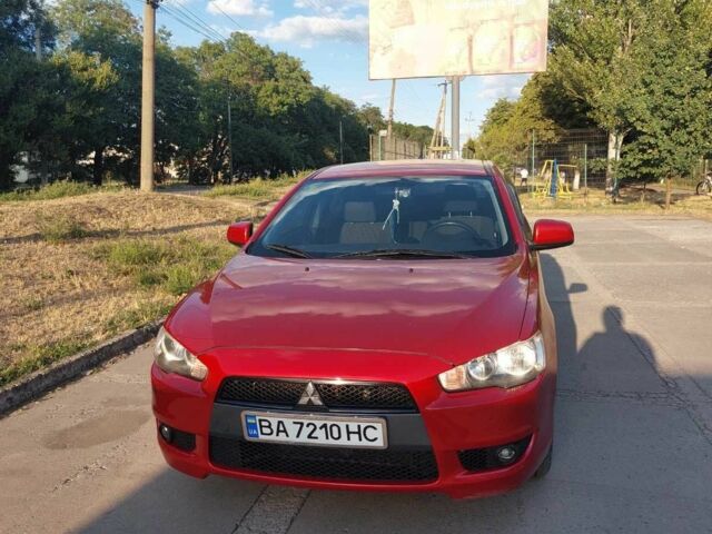 Красный Мицубиси Лансер, объемом двигателя 1.8 л и пробегом 221 тыс. км за 7500 $, фото 1 на Automoto.ua