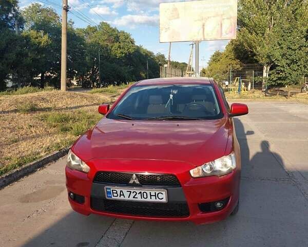 Красный Мицубиси Лансер, объемом двигателя 1.8 л и пробегом 221 тыс. км за 7500 $, фото 1 на Automoto.ua