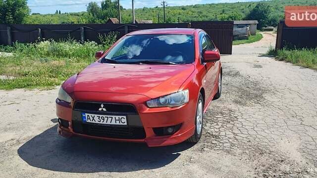 Червоний Міцубісі Lancer, об'ємом двигуна 1.8 л та пробігом 236 тис. км за 7000 $, фото 1 на Automoto.ua