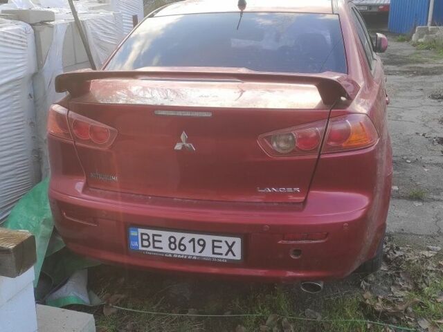 Красный Мицубиси Лансер, объемом двигателя 2 л и пробегом 170 тыс. км за 1600 $, фото 1 на Automoto.ua