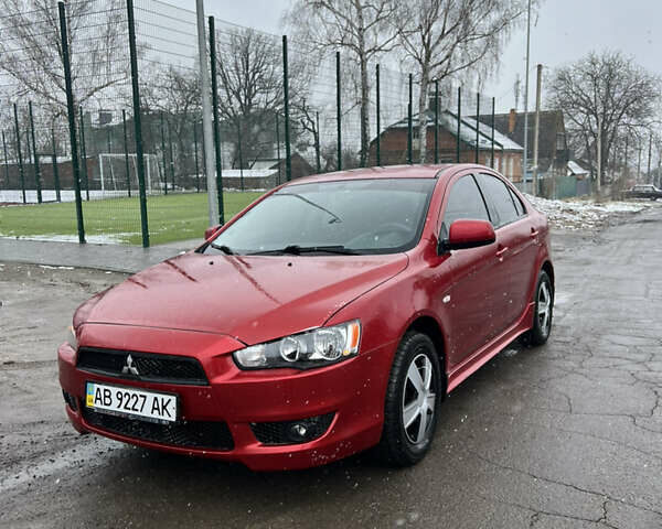 Червоний Міцубісі Lancer, об'ємом двигуна 1.8 л та пробігом 160 тис. км за 6500 $, фото 1 на Automoto.ua