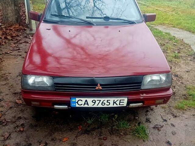 Червоний Міцубісі Lancer, об'ємом двигуна 1.5 л та пробігом 310 тис. км за 600 $, фото 1 на Automoto.ua