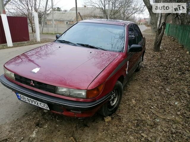 Червоний Міцубісі Lancer, об'ємом двигуна 1.5 л та пробігом 500 тис. км за 1400 $, фото 1 на Automoto.ua