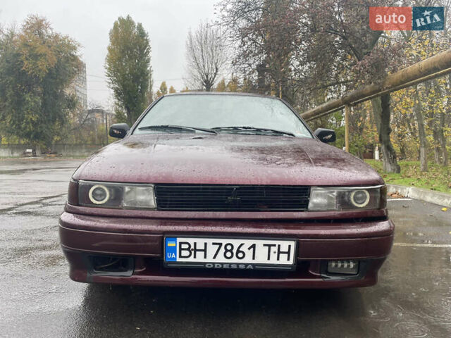 Красный Мицубиси Лансер, объемом двигателя 1.2 л и пробегом 220 тыс. км за 1300 $, фото 1 на Automoto.ua