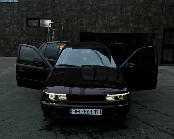 Красный Мицубиси Лансер, объемом двигателя 1.2 л и пробегом 420 тыс. км за 1600 $, фото 1 на Automoto.ua