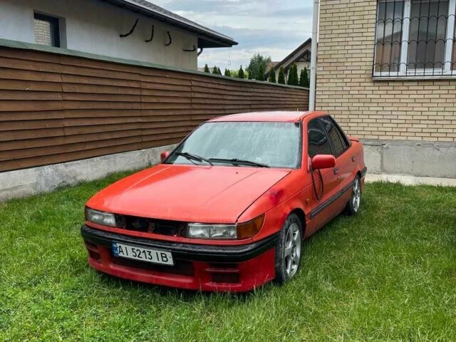 Червоний Міцубісі Lancer, об'ємом двигуна 1.8 л та пробігом 435 тис. км за 850 $, фото 1 на Automoto.ua
