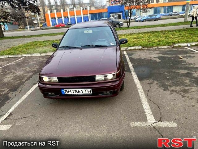 Красный Мицубиси Лансер, объемом двигателя 1.2 л и пробегом 420 тыс. км за 1900 $, фото 1 на Automoto.ua