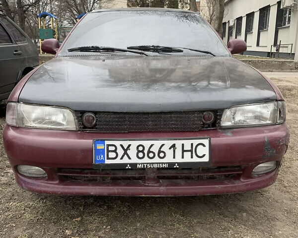 Червоний Міцубісі Lancer, об'ємом двигуна 1.6 л та пробігом 250 тис. км за 1000 $, фото 1 на Automoto.ua