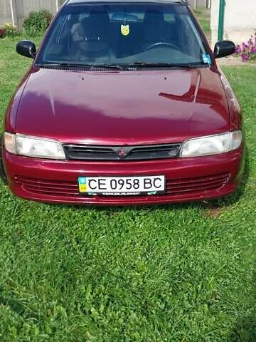 Червоний Міцубісі Lancer, об'ємом двигуна 1.3 л та пробігом 420 тис. км за 1900 $, фото 1 на Automoto.ua