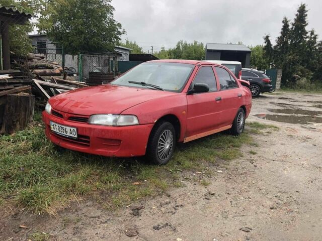 Червоний Міцубісі Lancer, об'ємом двигуна 1.5 л та пробігом 258 тис. км за 1100 $, фото 1 на Automoto.ua