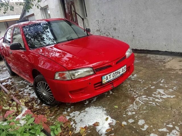 Червоний Міцубісі Lancer, об'ємом двигуна 1.3 л та пробігом 3 тис. км за 1079 $, фото 1 на Automoto.ua