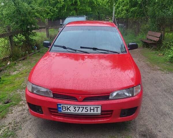 Червоний Міцубісі Lancer, об'ємом двигуна 1.3 л та пробігом 350 тис. км за 2500 $, фото 1 на Automoto.ua