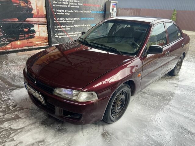 Червоний Міцубісі Lancer, об'ємом двигуна 1.3 л та пробігом 275 тис. км за 1500 $, фото 1 на Automoto.ua