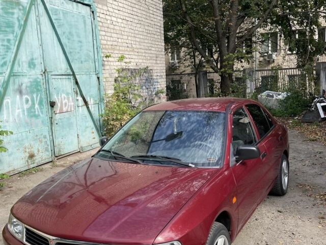 Червоний Міцубісі Lancer, об'ємом двигуна 1.3 л та пробігом 250 тис. км за 2000 $, фото 1 на Automoto.ua