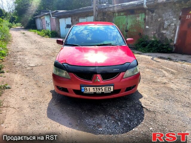 Червоний Міцубісі Lancer, об'ємом двигуна 1.6 л та пробігом 380 тис. км за 3400 $, фото 1 на Automoto.ua