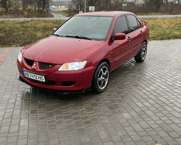 Червоний Міцубісі Lancer, об'ємом двигуна 1.58 л та пробігом 350 тис. км за 3600 $, фото 1 на Automoto.ua