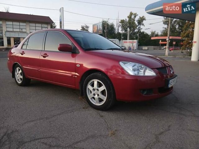 Червоний Міцубісі Lancer, об'ємом двигуна 1.58 л та пробігом 250 тис. км за 2999 $, фото 1 на Automoto.ua