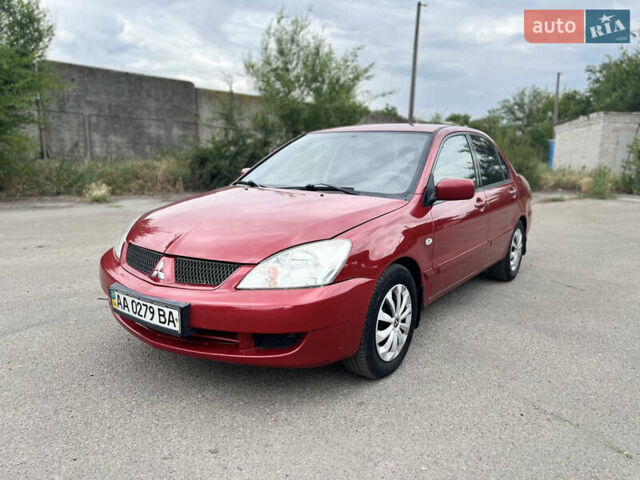 Червоний Міцубісі Lancer, об'ємом двигуна 1.6 л та пробігом 249 тис. км за 4250 $, фото 1 на Automoto.ua