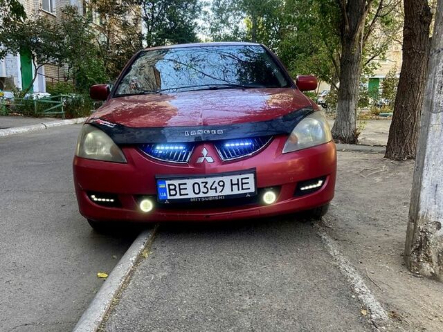Червоний Міцубісі Lancer, об'ємом двигуна 1.6 л та пробігом 0 тис. км за 4500 $, фото 1 на Automoto.ua