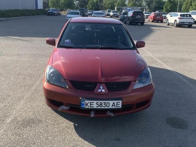 Червоний Міцубісі Lancer, об'ємом двигуна 1.6 л та пробігом 490 тис. км за 4000 $, фото 1 на Automoto.ua