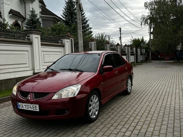 Червоний Міцубісі Lancer, об'ємом двигуна 1.6 л та пробігом 270 тис. км за 2200 $, фото 1 на Automoto.ua