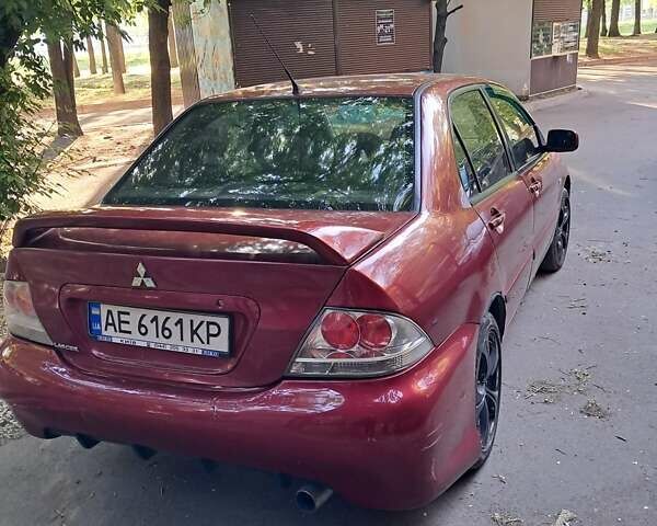 Червоний Міцубісі Lancer, об'ємом двигуна 1.6 л та пробігом 250 тис. км за 3199 $, фото 1 на Automoto.ua