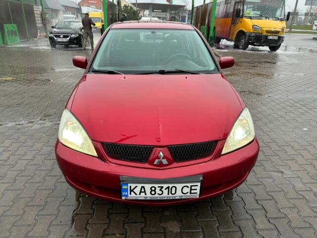 Червоний Міцубісі Lancer, об'ємом двигуна 1.6 л та пробігом 185 тис. км за 5000 $, фото 1 на Automoto.ua
