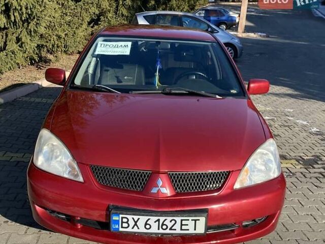 Червоний Міцубісі Lancer, об'ємом двигуна 1.58 л та пробігом 210 тис. км за 3800 $, фото 1 на Automoto.ua