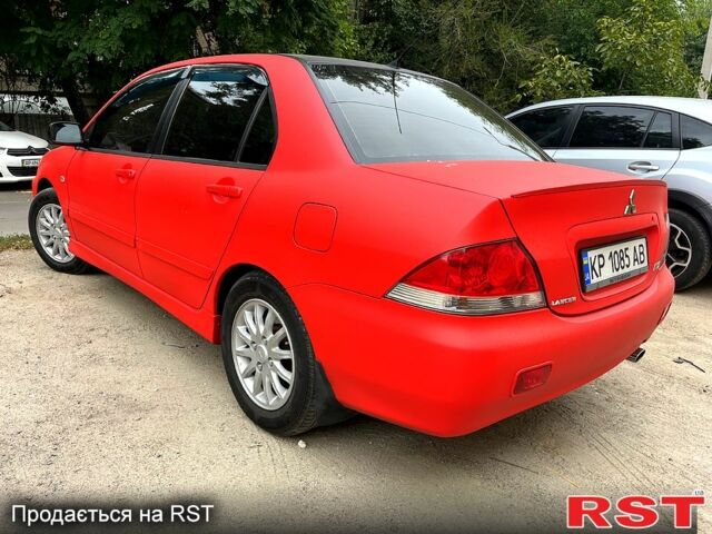 Червоний Міцубісі Lancer, об'ємом двигуна 1.6 л та пробігом 283 тис. км за 3500 $, фото 1 на Automoto.ua