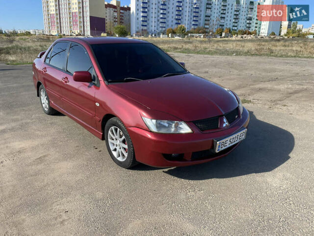 Червоний Міцубісі Lancer, об'ємом двигуна 1.58 л та пробігом 290 тис. км за 4350 $, фото 1 на Automoto.ua